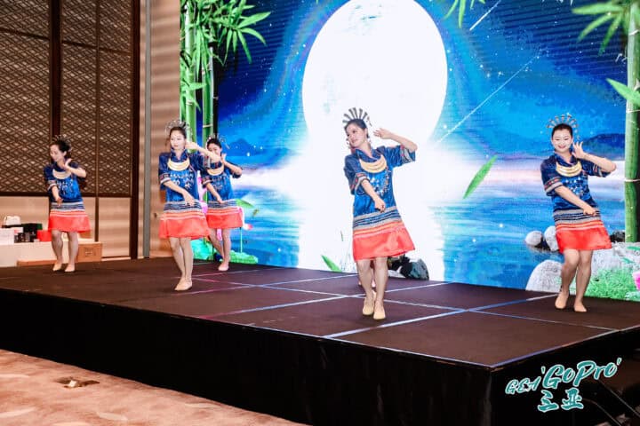 Dancers on stage at GEC conference in Hainan, China.