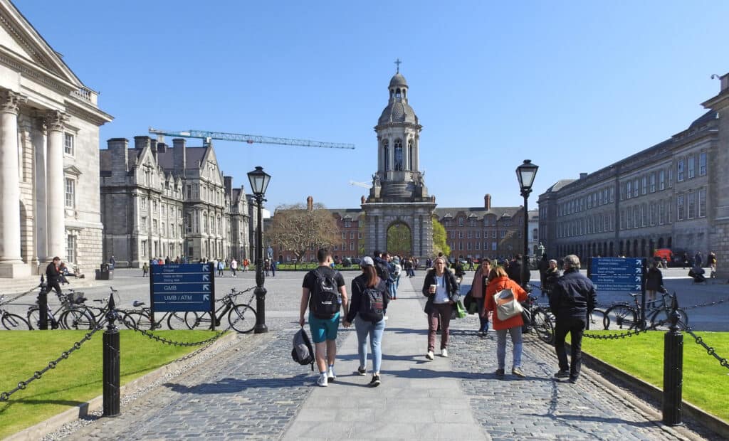 Irish students walking through Trinity College campus, Dublin.