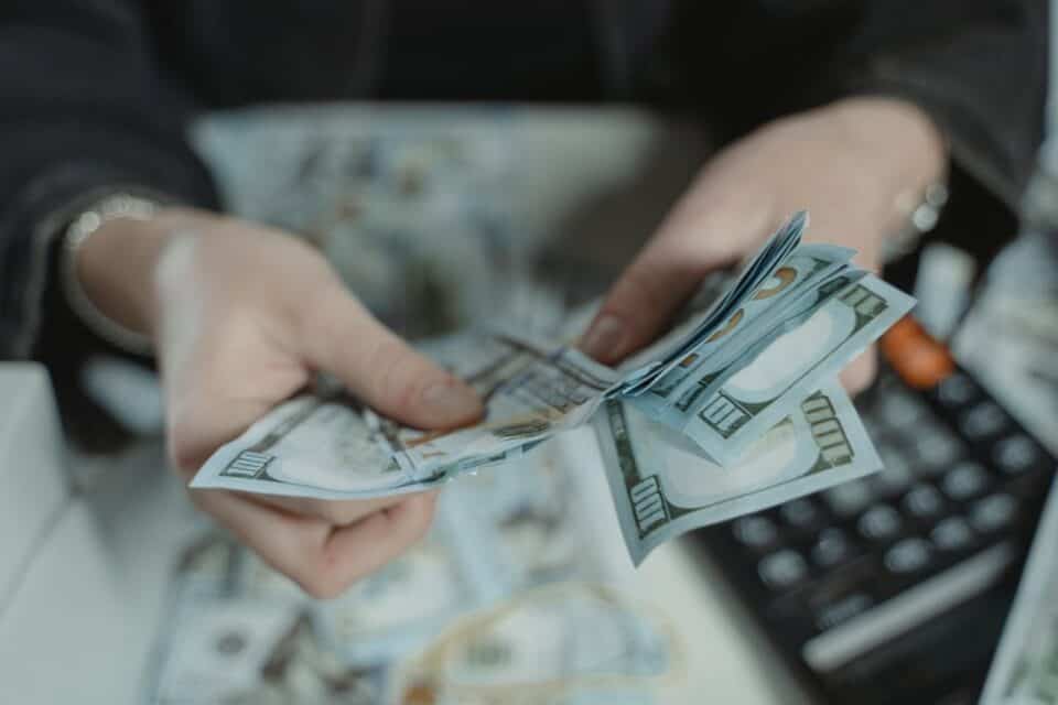 Counting money.