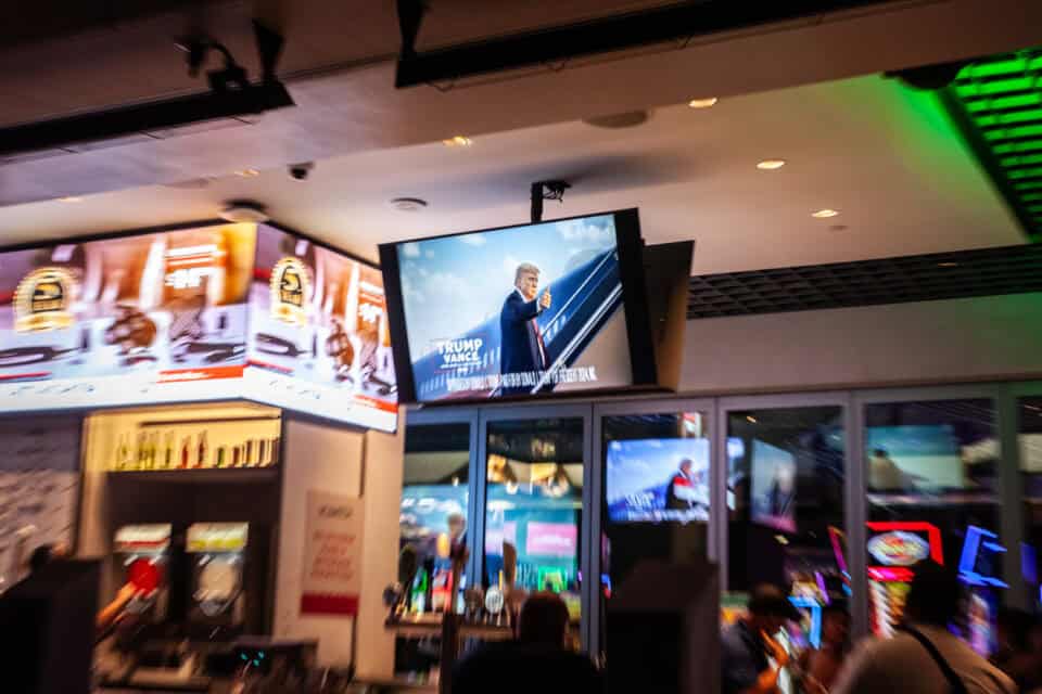 Donald Trump campaign on TV screen.